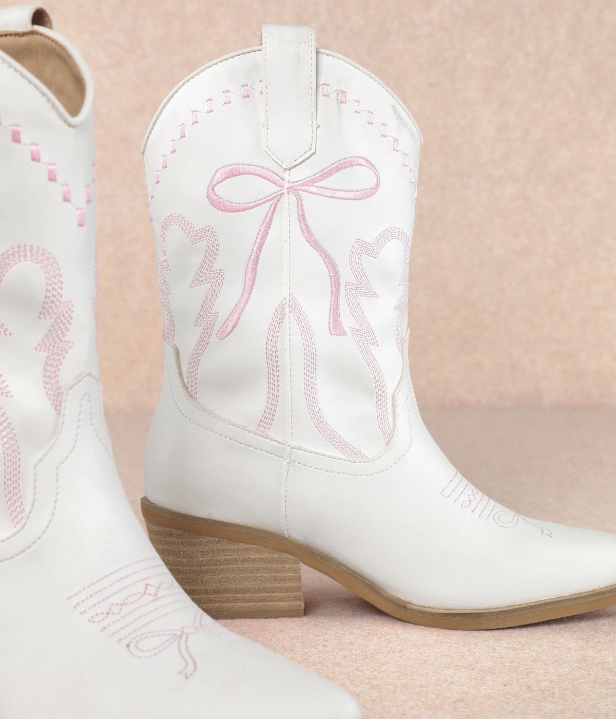 Zeta Mid Calf Boot in White with Pink Bow