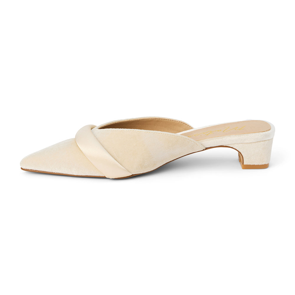 Kellan Heeled Mule – Matisse Footwear – Ivory velvet mule with a pointed toe, asymmetrical satin strap, and low block heel. A bold and elegant style that effortlessly elevates day-to-night dressing.