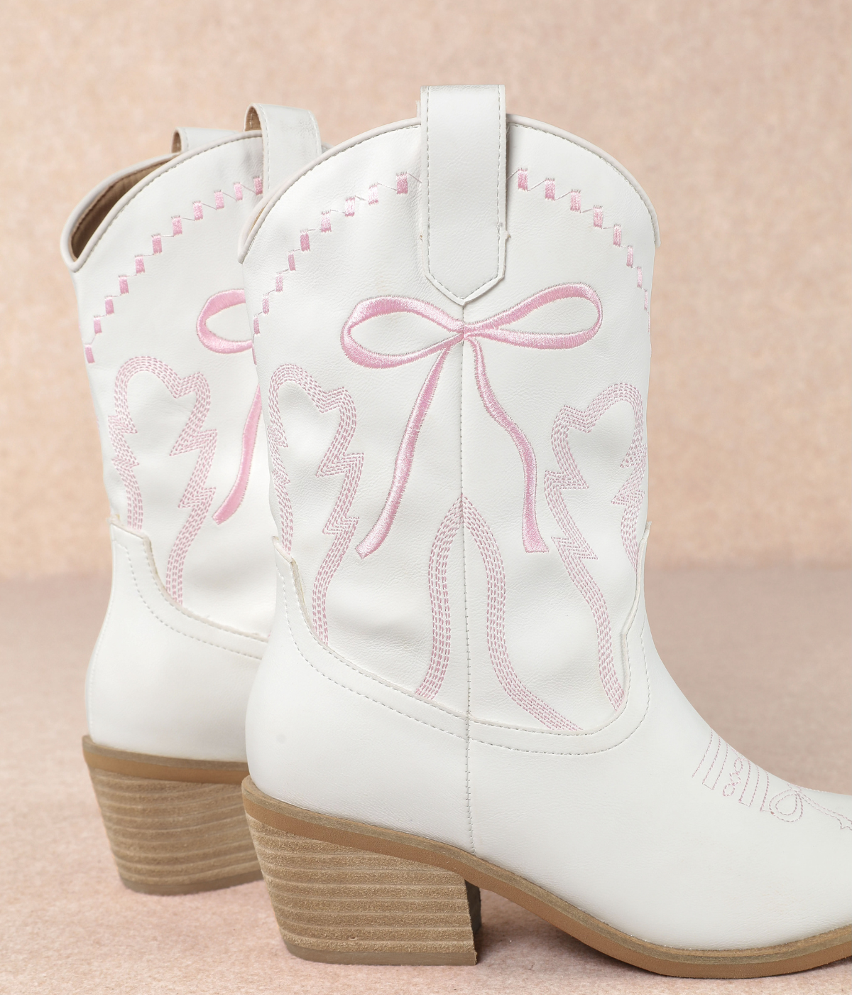 Zeta Mid Calf Boot in White with Pink Bow
