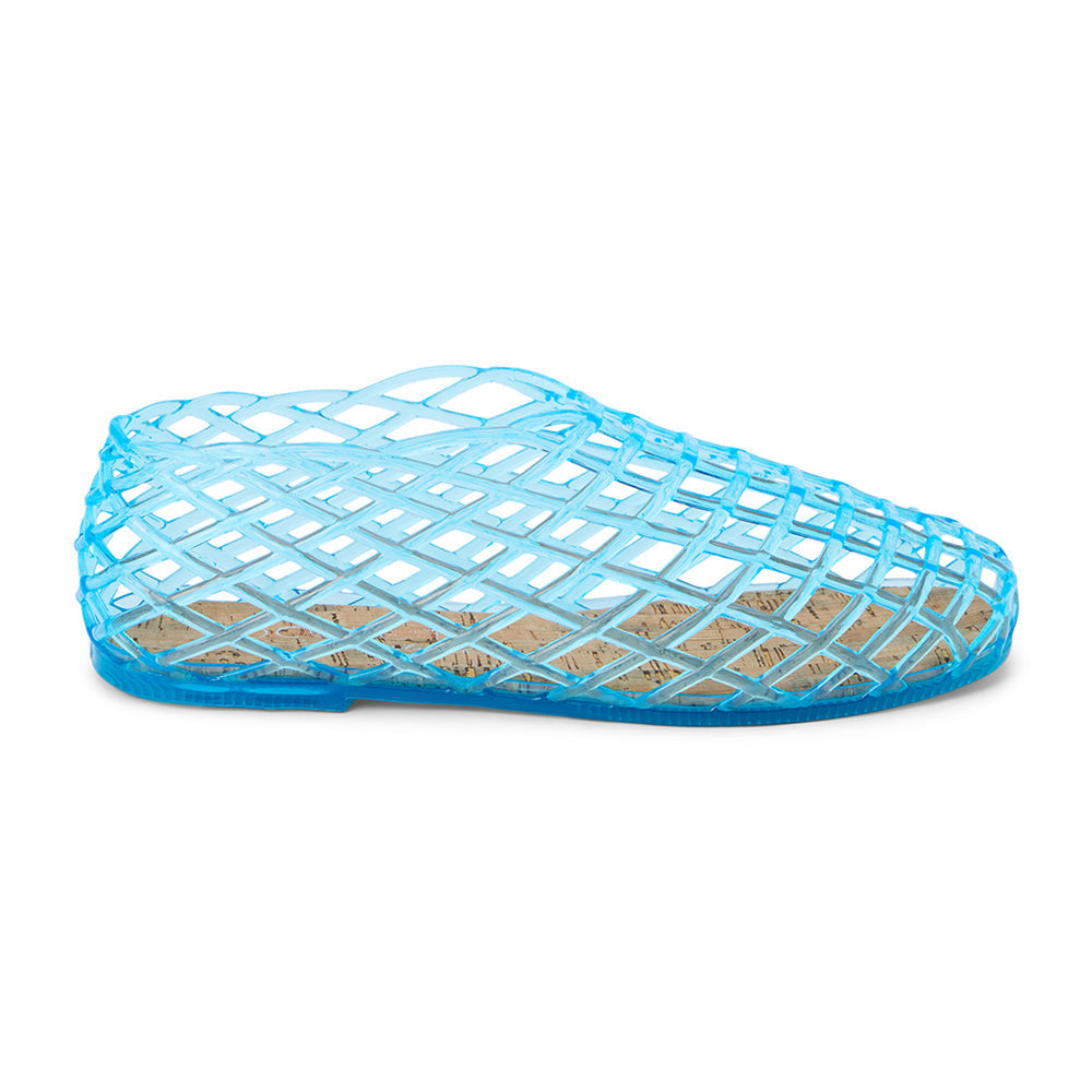 Marlow Jelly Flat – Coconuts by Matisse – Blue translucent jelly flats with an airy lattice design and a cork footbed for enhanced comfort. A breezy, flexible silhouette made for warm-weather style and ease.